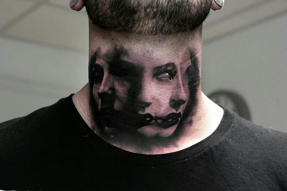Horror Girl Face Tattoo On Man Neck