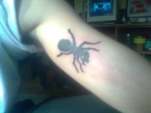 Inner Bicep Ant Tattoo