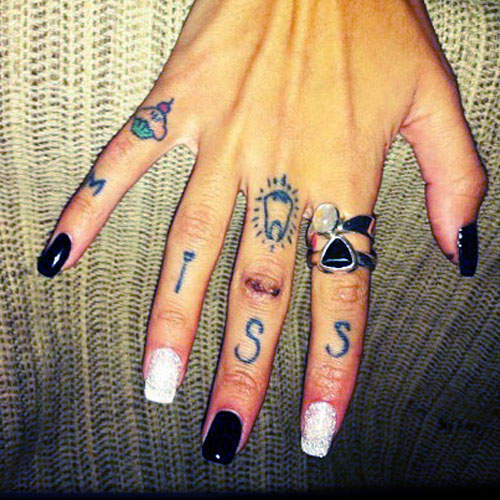 Knuckle Tattoo On Girl Right Hand