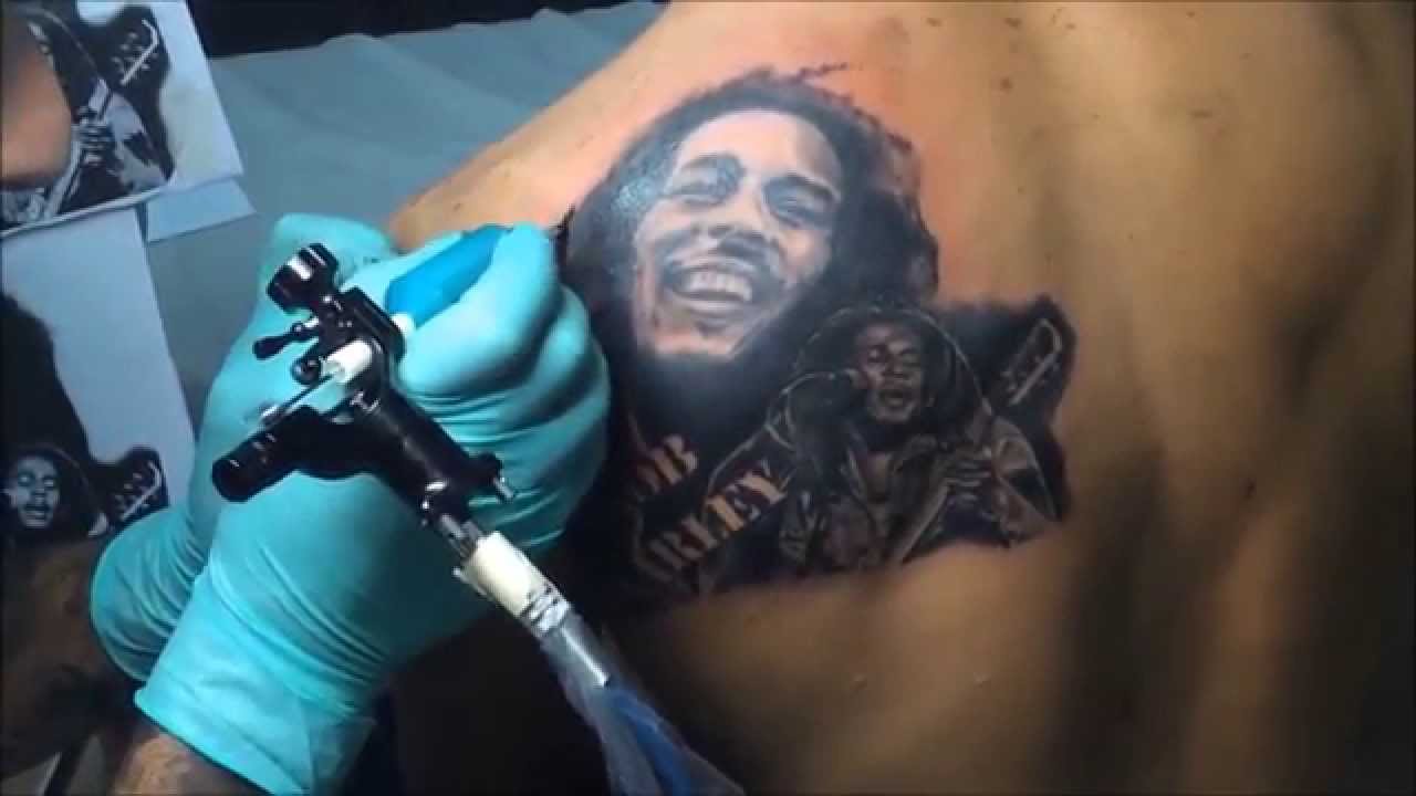 Left Back Shoulder Bob Marley Tattoo In Process