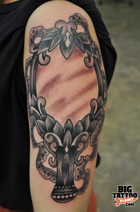 Left Half Sleeve Grey Ink Hand Mirror Tattoo On Half Sleeve