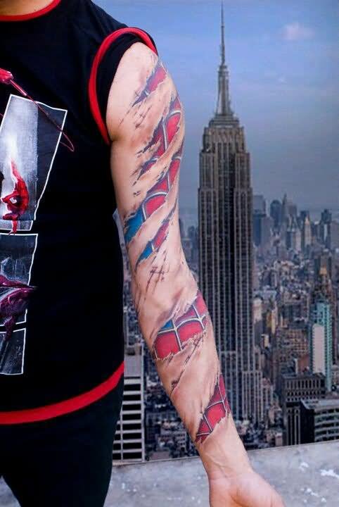 Left Ripped Skin Spiderman Tattoo On Left Sleeve