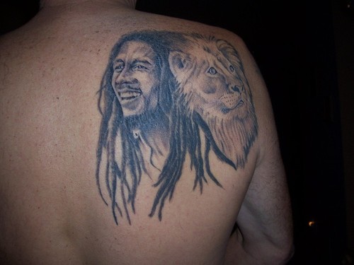Lion Head And Bob Marley Tattoo On Right Back Shoulder