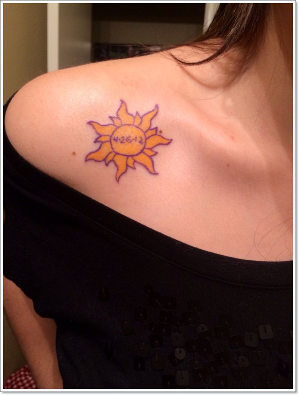 Memorial Sun Tattoo On Girl Collar Bone