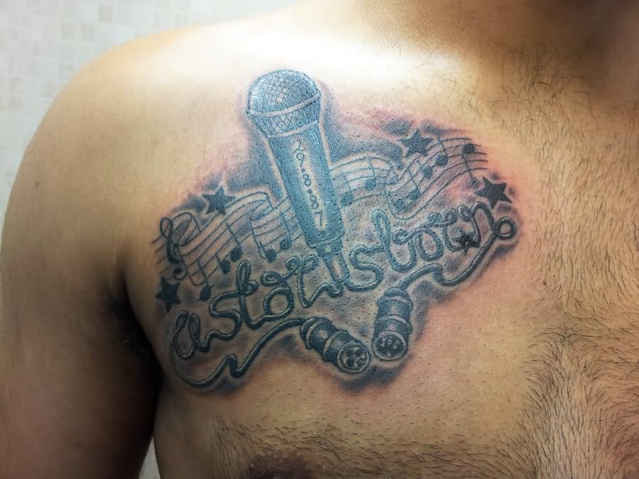 Microphone And Music Notes Tattoo On Collar Bone