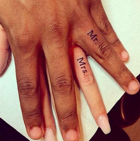 Mr And Mrs Lettering Tattoo On Couple Finger