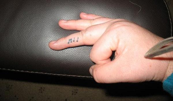 Music Knots Tattoo On Side Finger