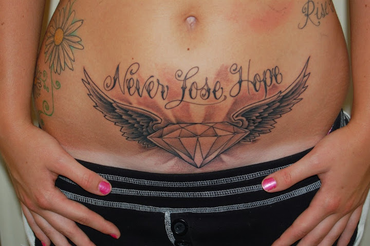 Never Lose Hope - Diamond With Wings Tattoo On Girl Stomach
