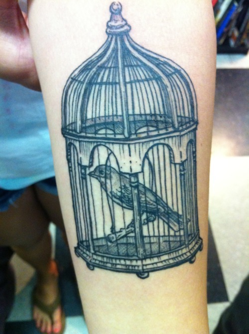 Nice Grey Ink Cage Tattoo On Arm