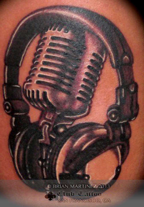 Nice Grey Ink Microphone And Headphone Tattoo