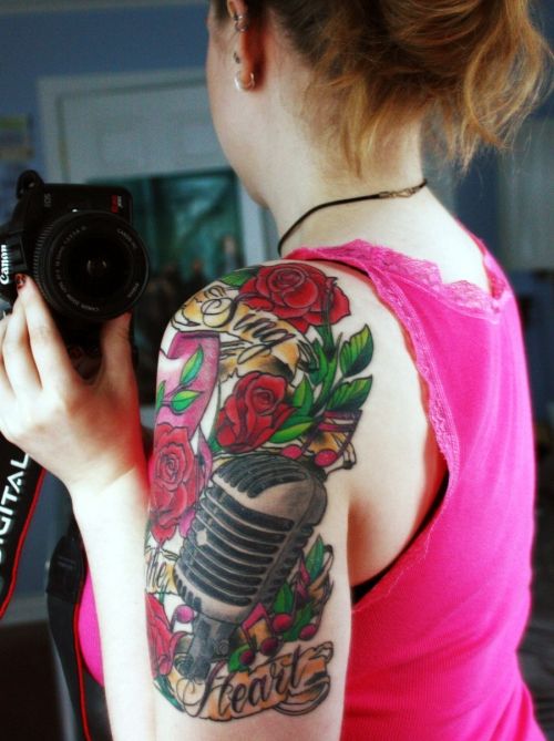 Nice Red Roses And Microphone Tattoo On Left Half Sleeve