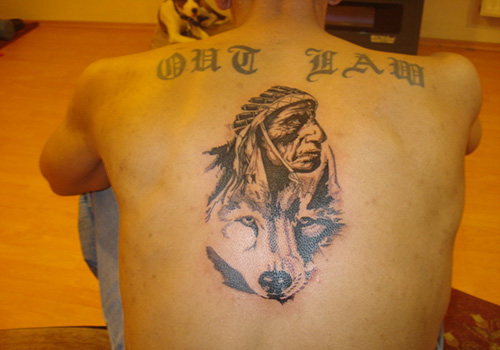 Old Indian Chief Female With Wolf Tattoo On Upper Back