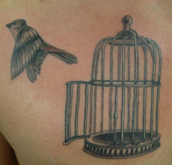 Open Cage Flying Bird Tattoo