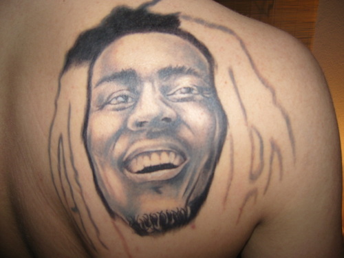 Outline Bob Marley Tattoo On Right Back Shoulder