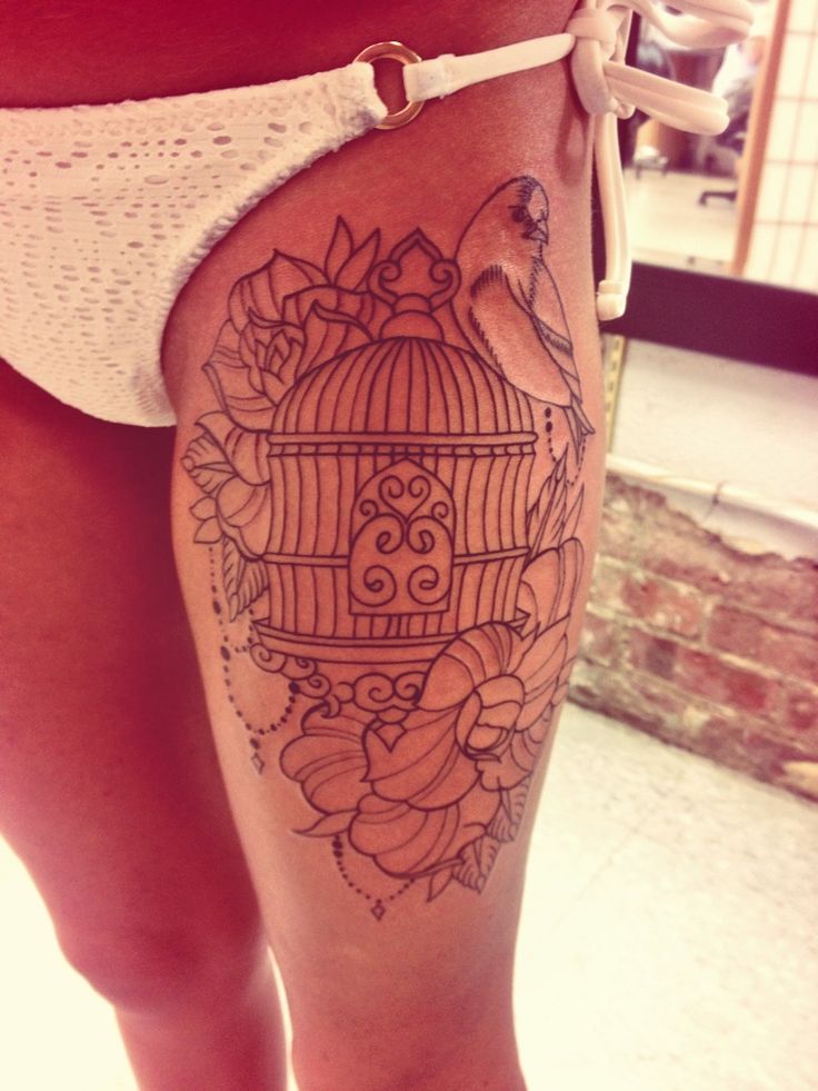Outline Flowers And Cage Tattoo On Left Thigh