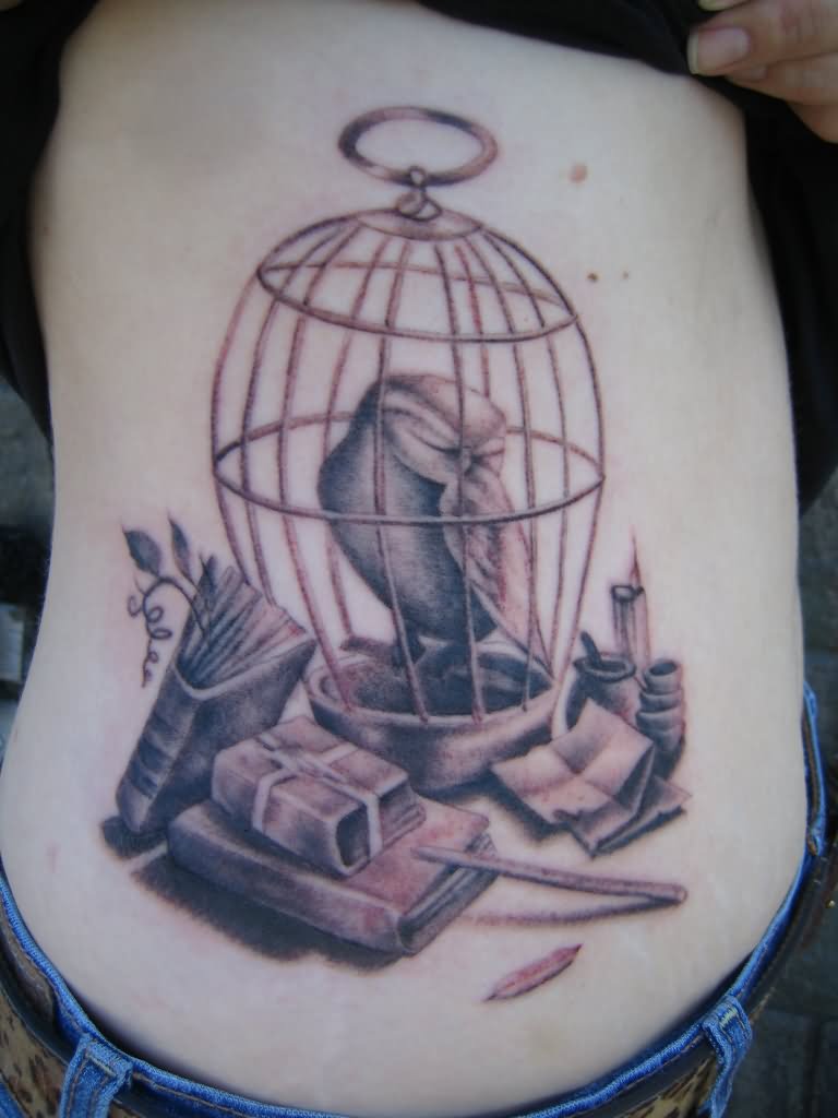 Owl In Cage Tattoo On Side Rib