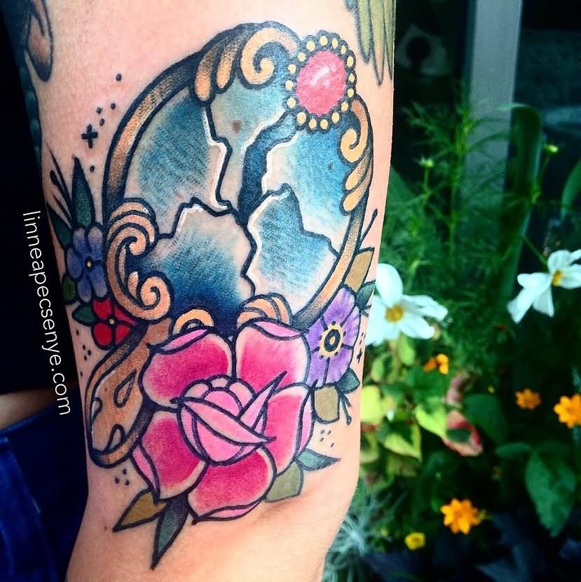 Pink Rose Flower And Hand Mirror Tattoo On Bicep