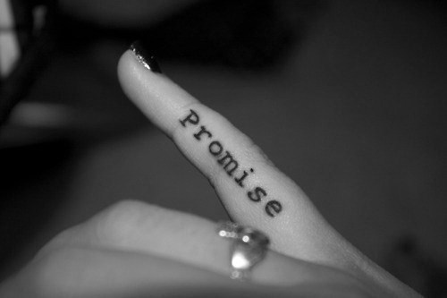 Promise Lettering Tattoo On Girl Finger