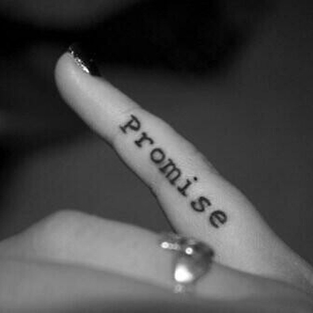 Promise Lettering Tattoo On Girl Side Finger