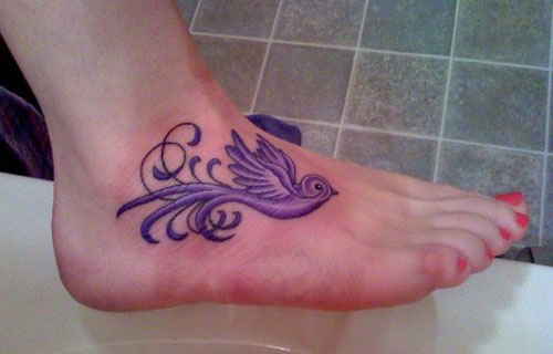Purple Ink Bird Tattoo On Girl Right Foot