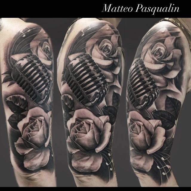 Realistic Grey Rose And Microphone Tattoo On Sleeve