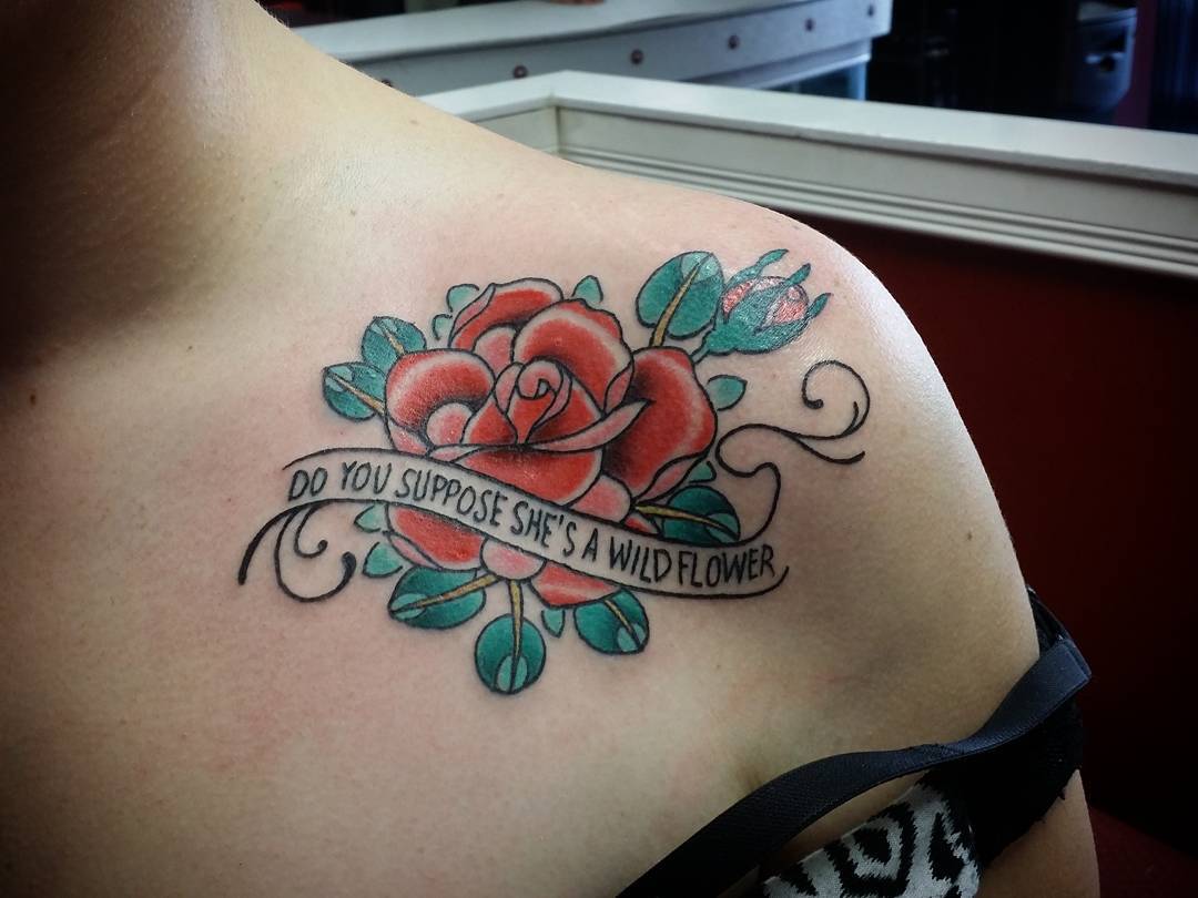 Red Rose With Banner Tattoo On Left Collar Bone