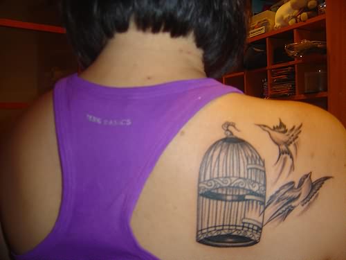 Right Back Shoulder Grey Ink Cage Tattoo