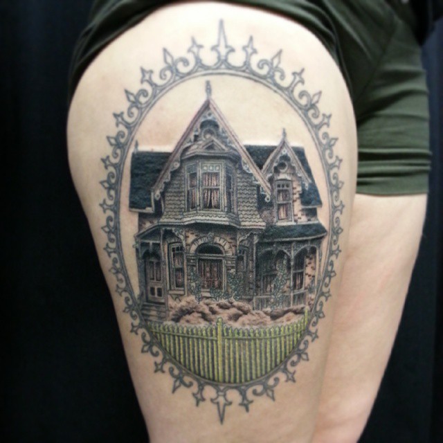 Right Bicep Haunted House Tattoo On Thigh