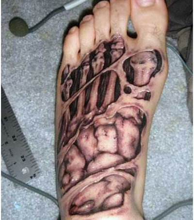 Ripped Skin Skeleton Foot Tattoo On Left Foot