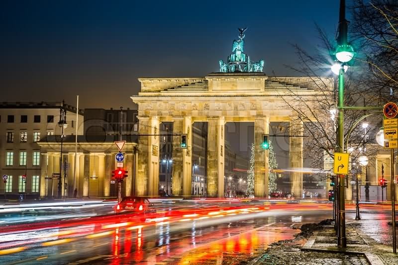 Road Side View Of The Brandenburg Gate At Night With Motion Lights