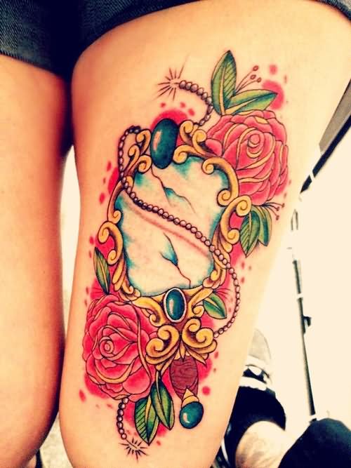 Rose Flowers And Hand Mirror Tattoo On Thigh