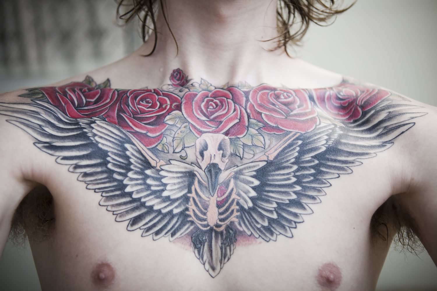 Rose Flowers With Bird Skeleton Tattoo On Collar Bone