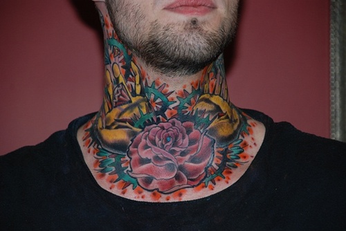 Rose Tattoo On Front Neck