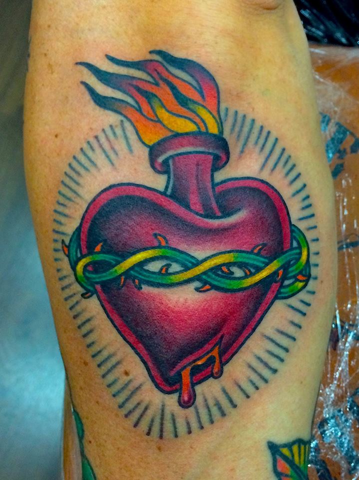 Sacred Heart Tattoo On Left Sleeve