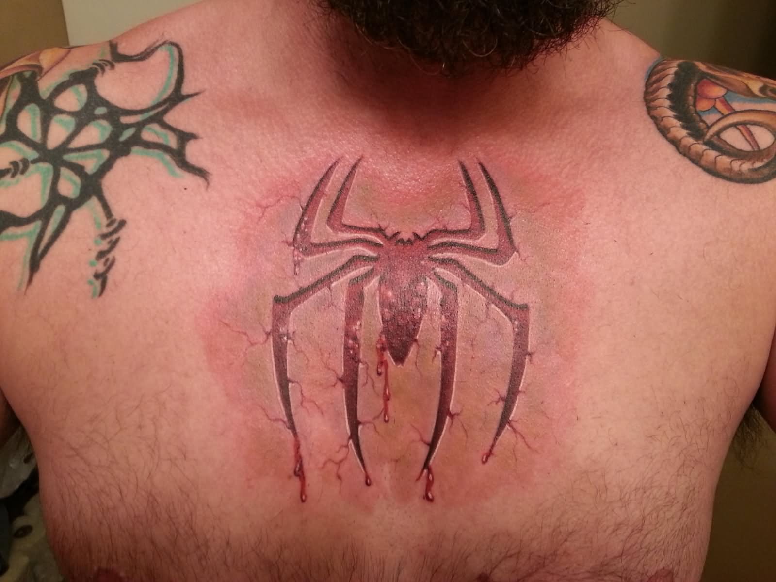Scarification Spiderman Logo Tattoo On Man Chest