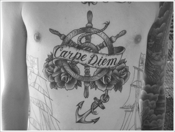 Ship Wheel With Anchor And Roses Tattoo On Man Stomach