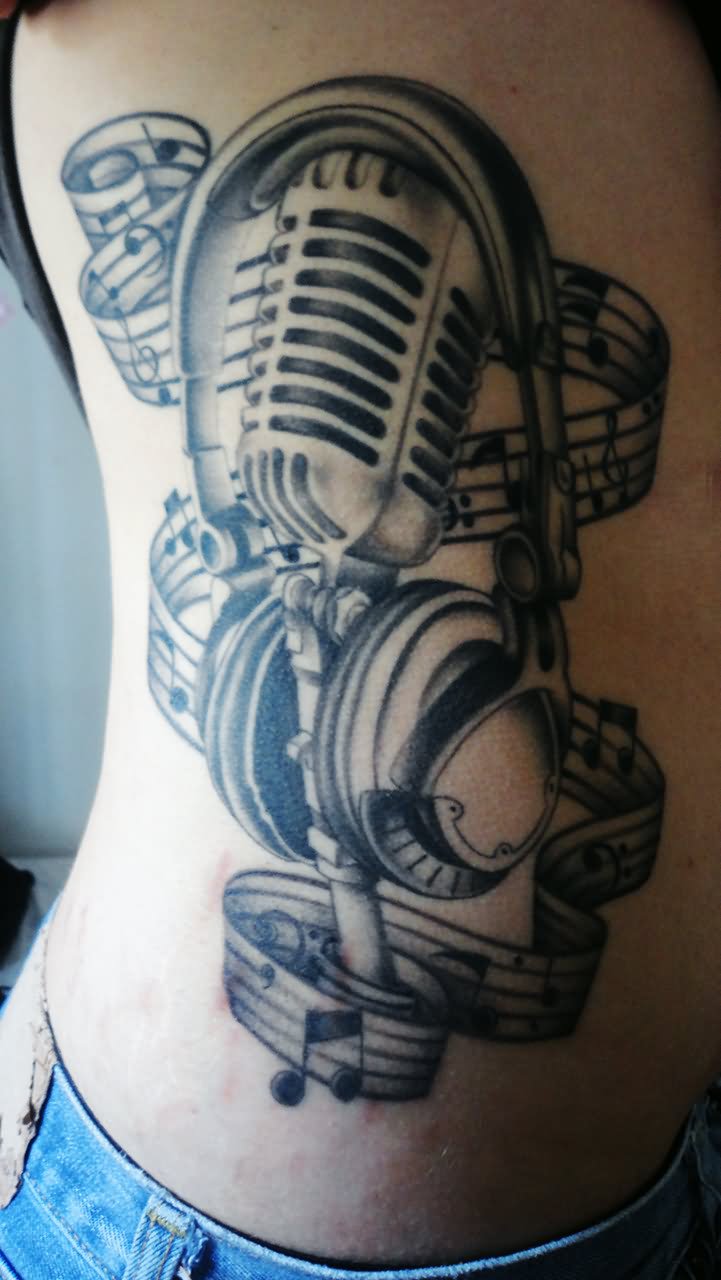 Side Rib Grey Ink Music Notes And Mic Tattoo