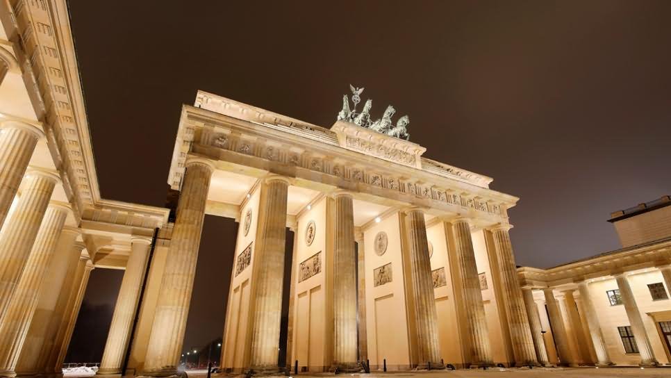 Side View Of The Brandenburg Gate In Berlin At Night