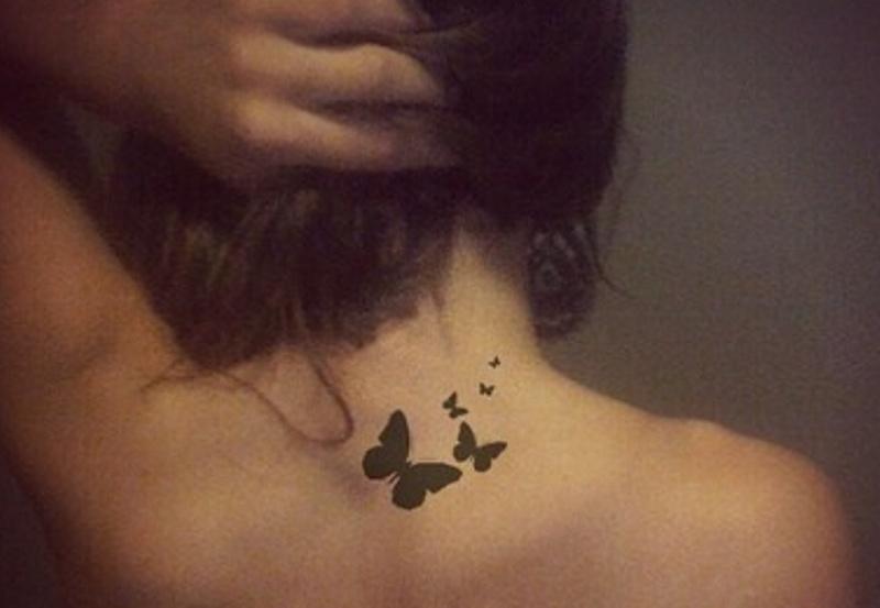 Silhouette Butterflies Tattoo On Girl Back Neck