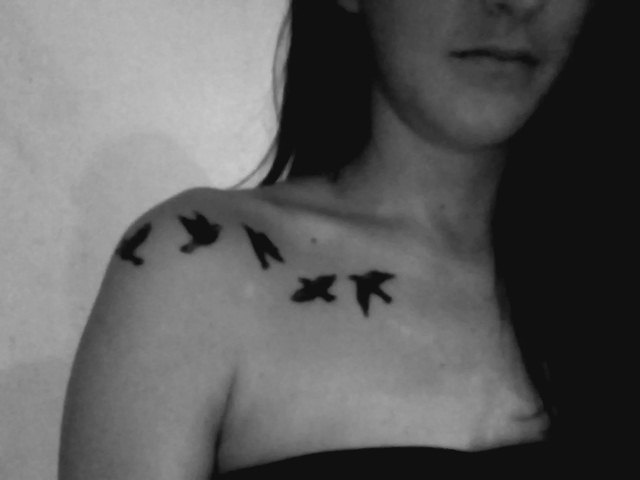 Silhouette Flying Birds Tattoo On Girl Right Collar Bone