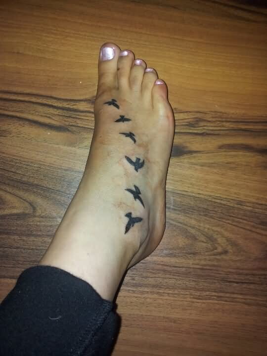 Silhouette Flying Birds Tattoo On Girl Right Foot