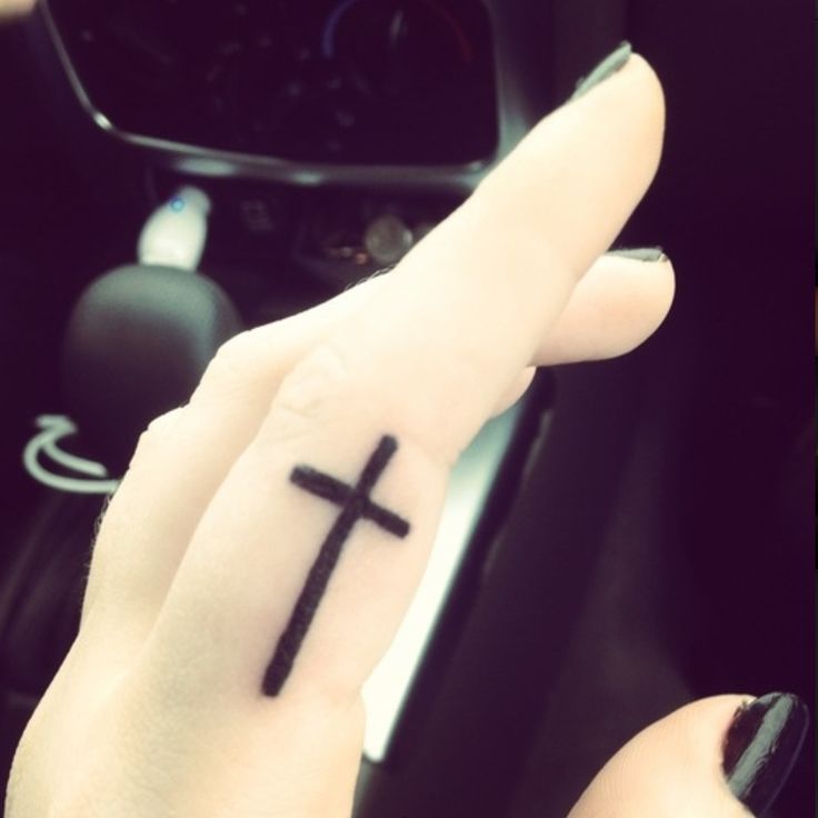 Simple Black Cross Tattoo On Girl Side Finger
