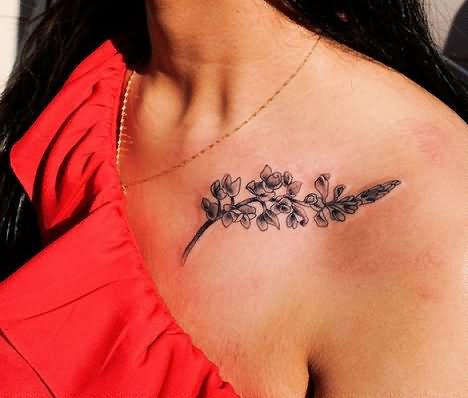 Simple Black Ink Flowers Tattoo On Girl Collar Bone