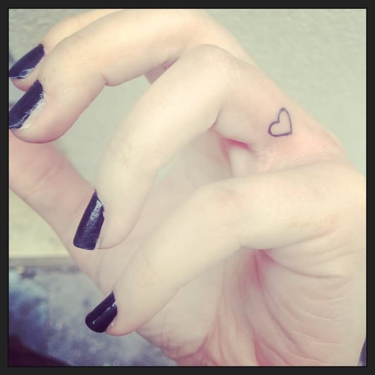 Simple Black Outline Heart Tattoo On Girl Inner Finger