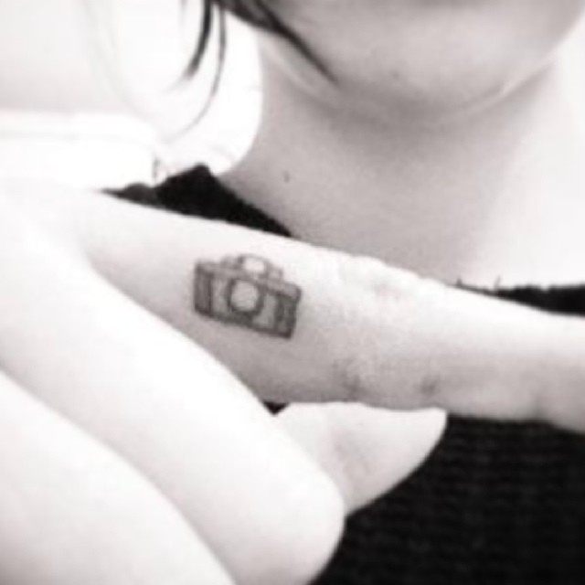 Simple Camera Tattoo On Girl Finger