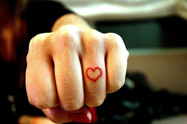 Simple Red Outline Heart Tattoo On Girl Finger
