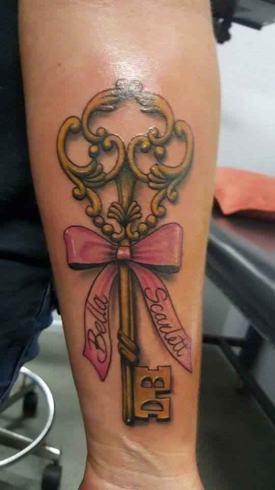 Skeleton Key With Pink Bow Tattoo On Forearm by Kano