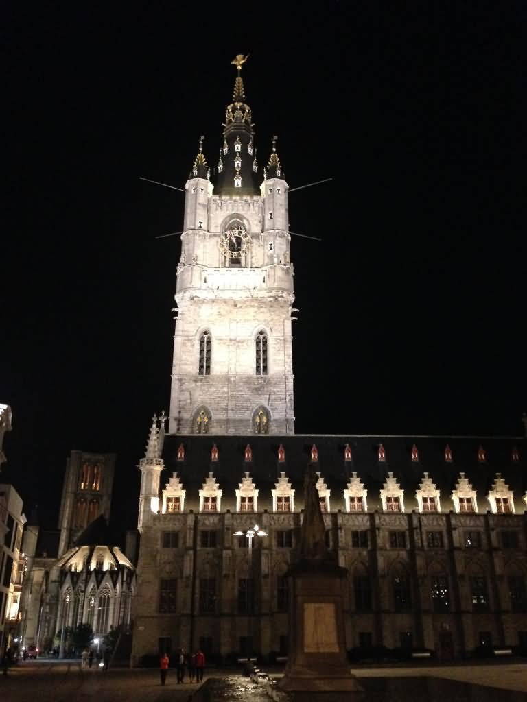 St. Nicholas Church And Belfry Of Ghent Lit Up At Night