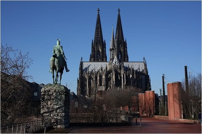 Statue In Front Of The Cologne Cathedral In Cologne