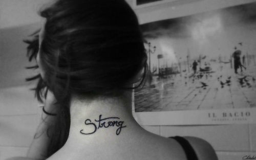 Strong Word Tattoo On Girl Back Neck